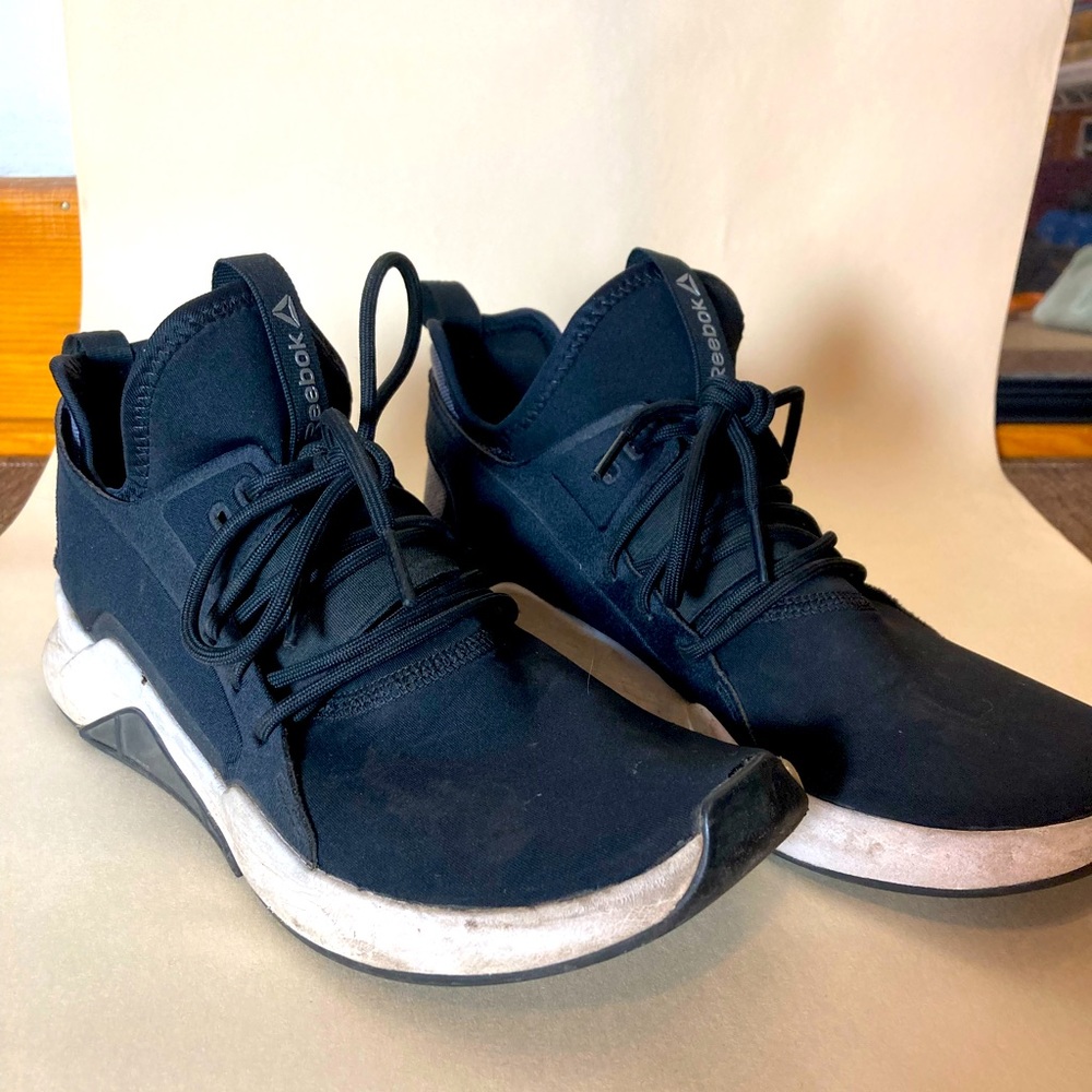 Black Reebok sneakers